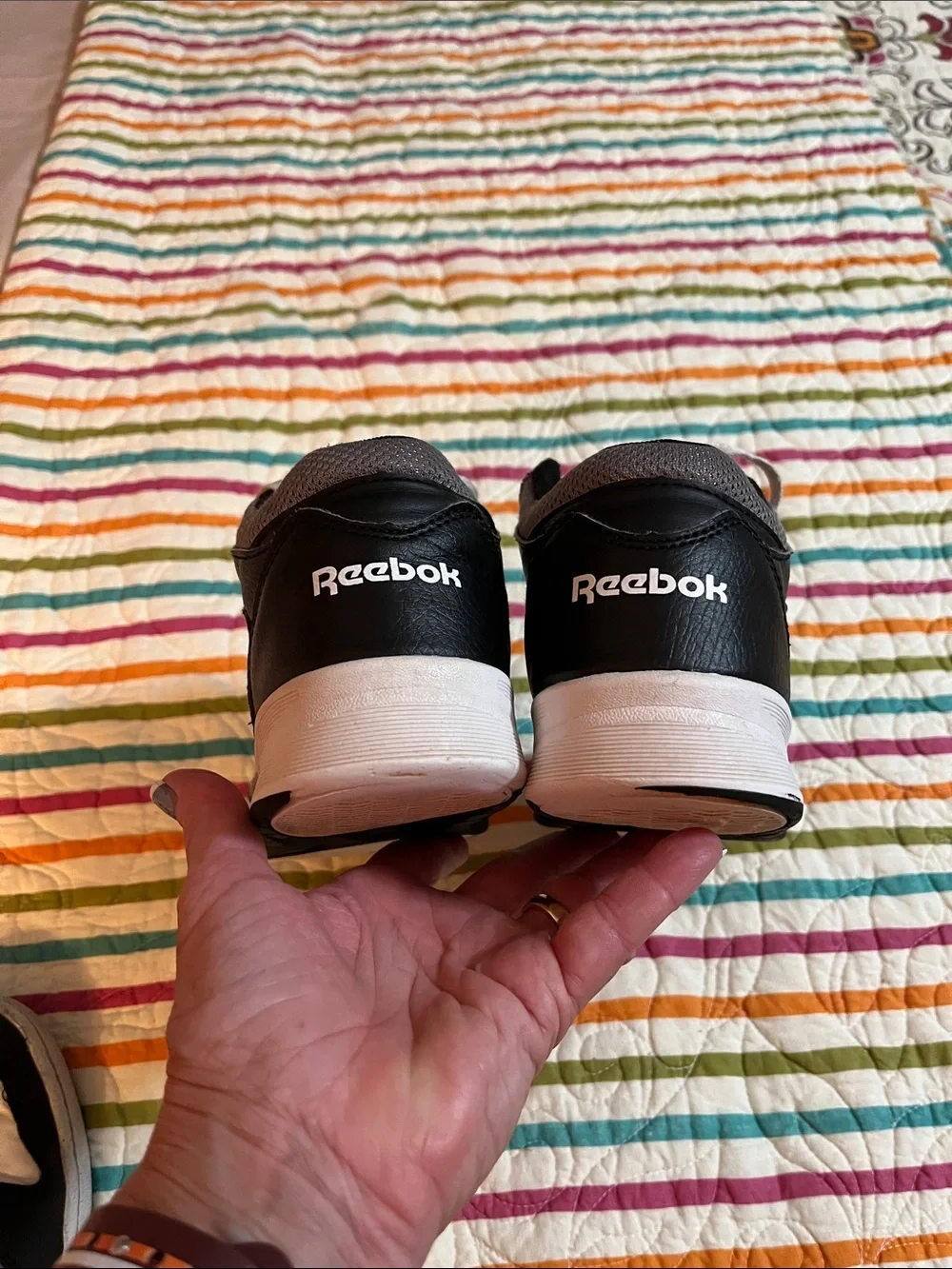Gray and black Reebok youth size 5
